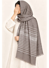 Dark Grey Turkish lawn scarf with white stripes and fringed edges by Hijab ul Hareem, worn as a hijab