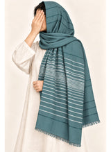 Teal Turkish lawn scarf with white stripes and fringed edges by Hijab ul Hareem, worn as a hijab