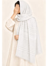 White Turkish lawn scarf with subtle grey stripes and fringed edges by Hijab ul Hareem, worn as a hijab