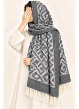 Charcoal geometric wool winter scarf, 31 × 72 inches, worn as a hijab on a model — Hijab Ul Hareem