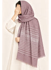Mauve Turkish lawn scarf with white stripes and fringed edges by Hijab ul Hareem, worn as a hijab