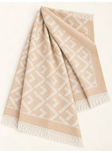 Beige geometric wool winter scarf, 31 × 72 inches, laid out showing its geometric pattern and fringed ends — Hijab Ul Hareem