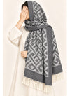 Charcoal geometric wool winter scarf, 31 × 72 inches, worn as a hijab on a model — Hijab Ul Hareem