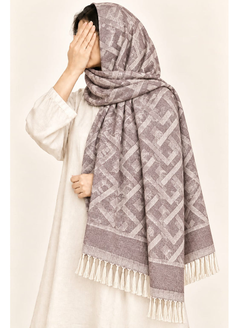 Mauve geometric wool winter scarf, 31 × 72 inches, worn as a hijab on a model — Hijab Ul Hareem